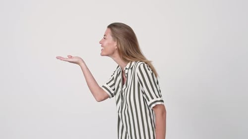 Woman Blowing a Kiss