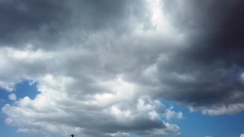 Clouds Dancing in a Blue Sky