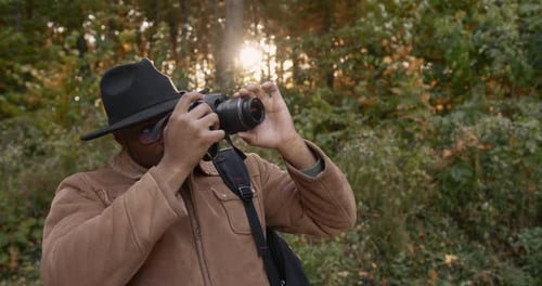 A Young Black Traveler Shoots the Forest on Camera
