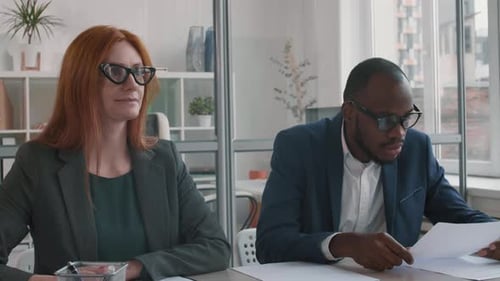 Corporate People Interviewing Unrecognizable Man