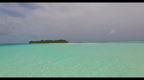 Aerial flying over seascape of idyllic shore beach journey by blue sea with white sand background of
