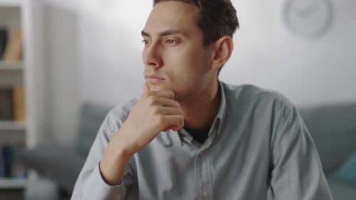 Male Freelancer Using Laptop for Work