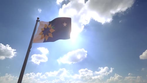 Symbolic Geometric Flag Waving Against Bright Sunny Sky