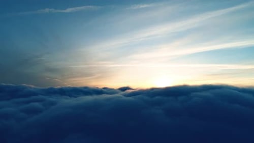 Majestic Sunrise over Layer of Thick Clouds