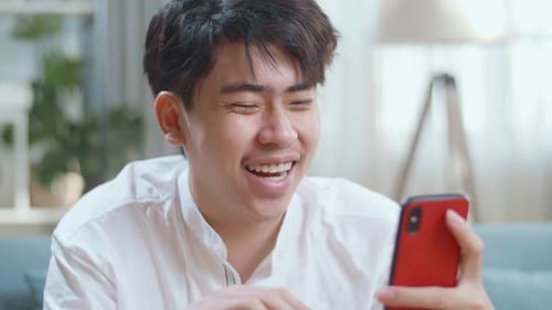 Young Adult Video Chatting on Smartphone