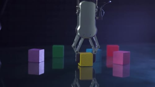 Futuristic Robot Hand Picks Up and Moves Colored Cubes, Artificial Intelligence Controls the Robot's