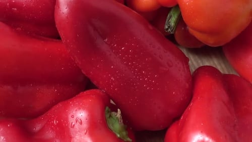 Fresh Red Bell Peppers with Water Droplets