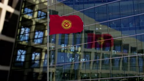 Realistic Waving Kyrgyzstan Flag Against Modern Building