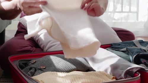 Folding Clothing for Suitcase Travel Packing Preparation