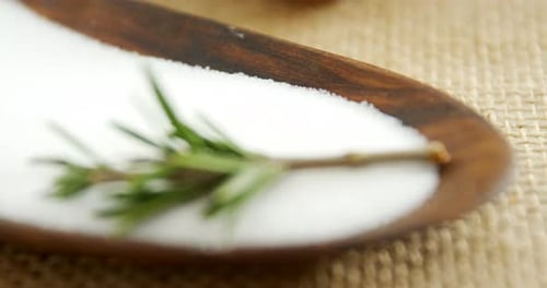 Salt and rosemary herb in bowl 4k