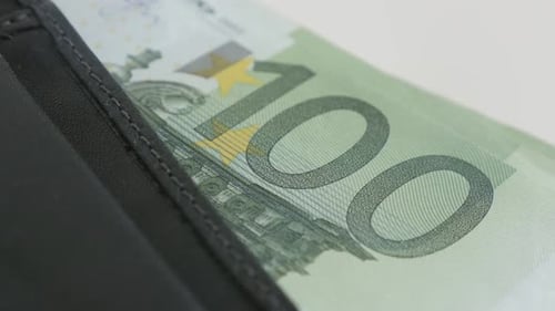 Close up of 100 euro bill in wallet
