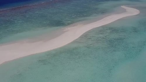 Drone aerial tourism of exotic coast beach trip by blue sea with sand background