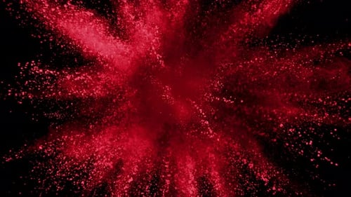 Red powder exploding on black background in super slow motion, shot with Phantom Flex 4K