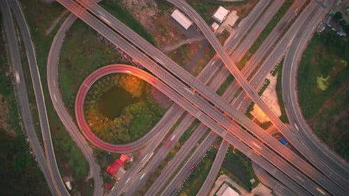 4K : Aerial Hyper lapse drone view of road junction with moving cars.