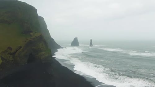Reynisfjara Beach and Reynisdrangar Rocks. Iceland. Aerial View