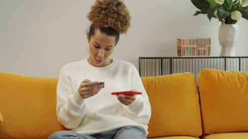 Woman Shopping Online With Credit Card On Smartphone
