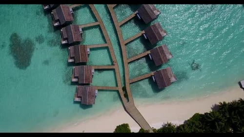 Aerial drone shot seascape of perfect shore beach break by blue sea and white sand background of adv