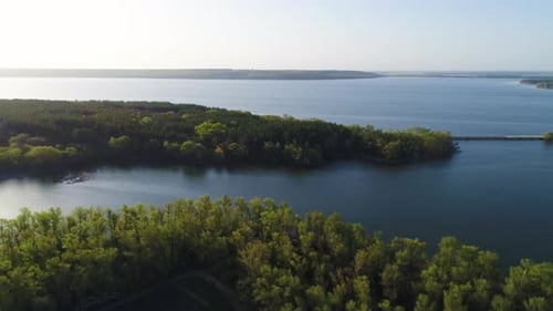 Flying Over the Beautiful Spring River. Aerial Camera Shot. Ukraine