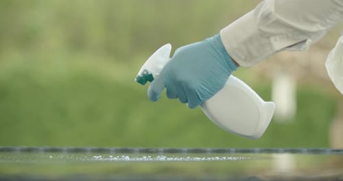 Using Disinfecting Spray