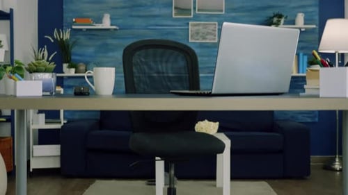 Modern Home Office Setup with Laptop and Desk