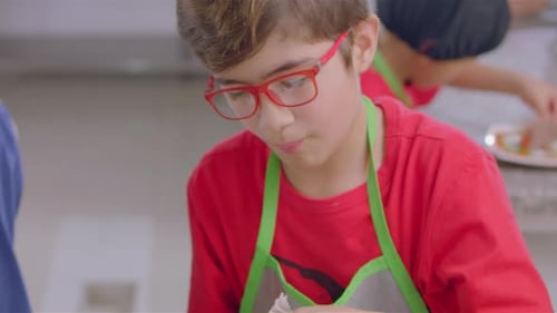 Children Preparing Meal in Bright Kitchen