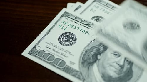 Stacking United States One Hundred Dollar Bills