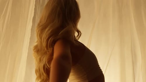 Closeup of Professional Dancer Performing in Studio in Soft Warm Lighting
