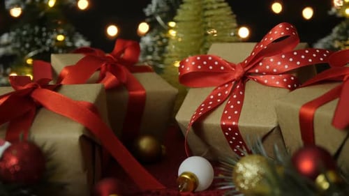 Christmas Gifts with Red Ribbons and Mini Christmas Trees