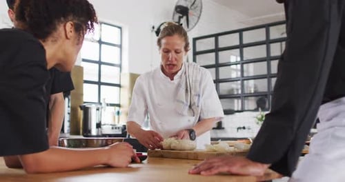 Chef Teaches Cooking Class About Dough