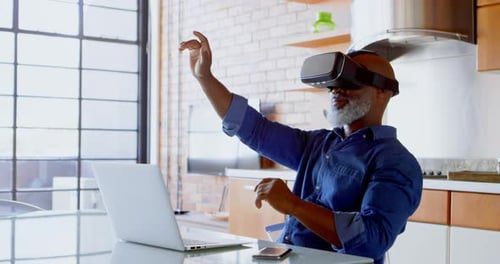 Man Experiencing Virtual Reality Using a VR Headset