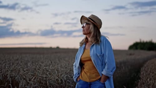 Image Of Conceived Middle Aged Woman In Wheat Field.
