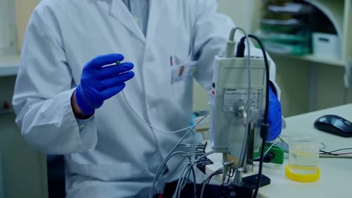 Scientist working at laboratory. Close up of researchers at work in laboratory