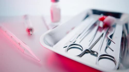 Medical Instruments in Steel Tray on Table for Surgery