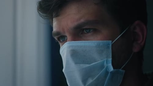 Adult Wearing Protective Face Mask Close Up