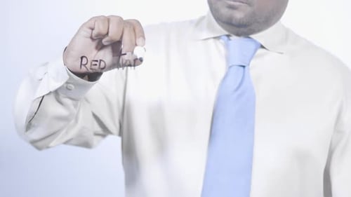 Asian Indian Businessman Writes Red Tape