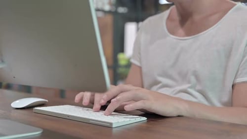 Close Up Shoot of Young Guy Hands Typing on Keyboard
