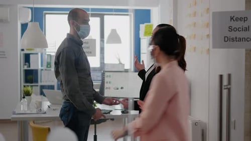 Company Team with Medical Face Mask Touching Elbow to Avoid Coronavirus Infection