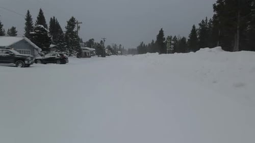 Aerial View of a Snowy Day in American Town of Showing Rows Houses with Snow Covered Roofs the