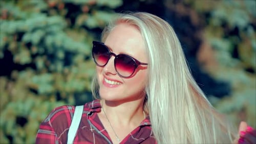 Close-Up Portrait of European Beautiful Cute Blonde in with Sunglass Young Woman or Cheerful Girl
