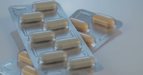 Pharmaceutical Pills in Blister Packs Rotating Close Up
