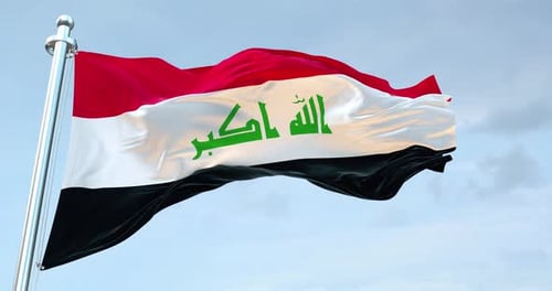 Realistic Waving Flag of Iraq Against Blue Sky