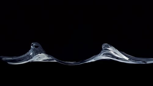 Water Surface Rippling on Black Background