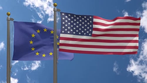 United States and European Union Flags Waving in Wind