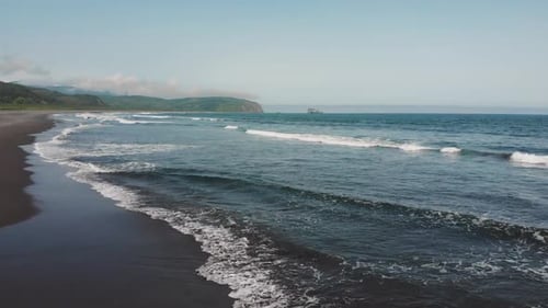Drone Flight Over the Azure Sea with Waves and Sandy Coast in Summer Afternoon