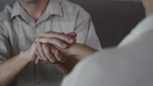 Man Massaging Hand for Wellness and Physical Therapy