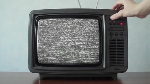 Switching Channels on Vintage Television with Static