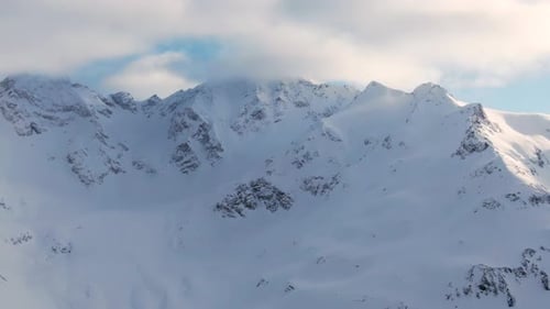 Majestic Snow-Covered Mountains Aerial View