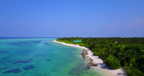 Wide drone abstract shot of a sandy white paradise beach and aqua blue water background