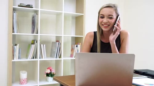 Blonde Business Woman Working at Modern Office