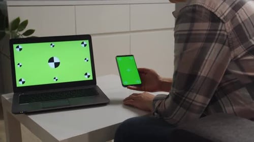 Side Moving of Camera Woman Holding Phone with Chromakey Green Screen